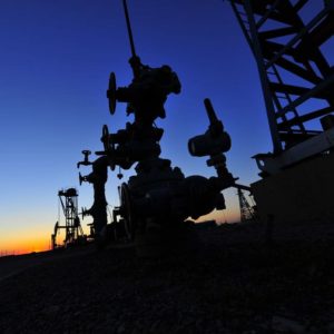 Wellhead with sunset in background