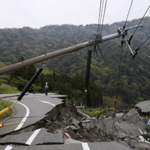 Collapsed Roadway with power pole fallen over the roadway