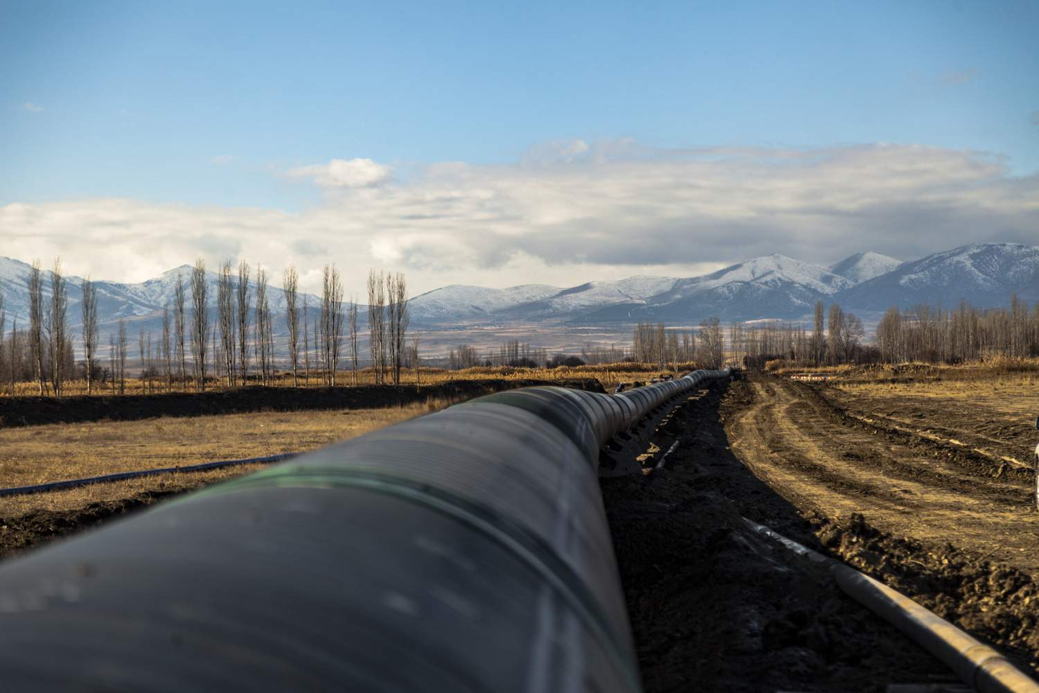 surface pipeline approaching mountains