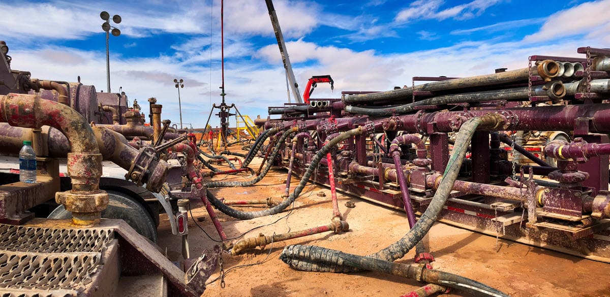 Wellhead connected to fracking pumps
