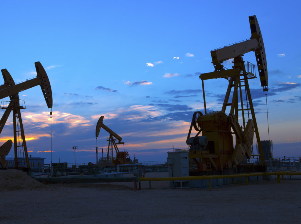 Oil well pump jacks at sunrise
